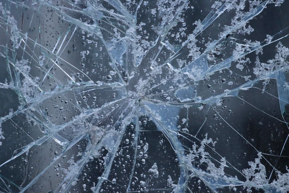Broken car windshield prior to replacement