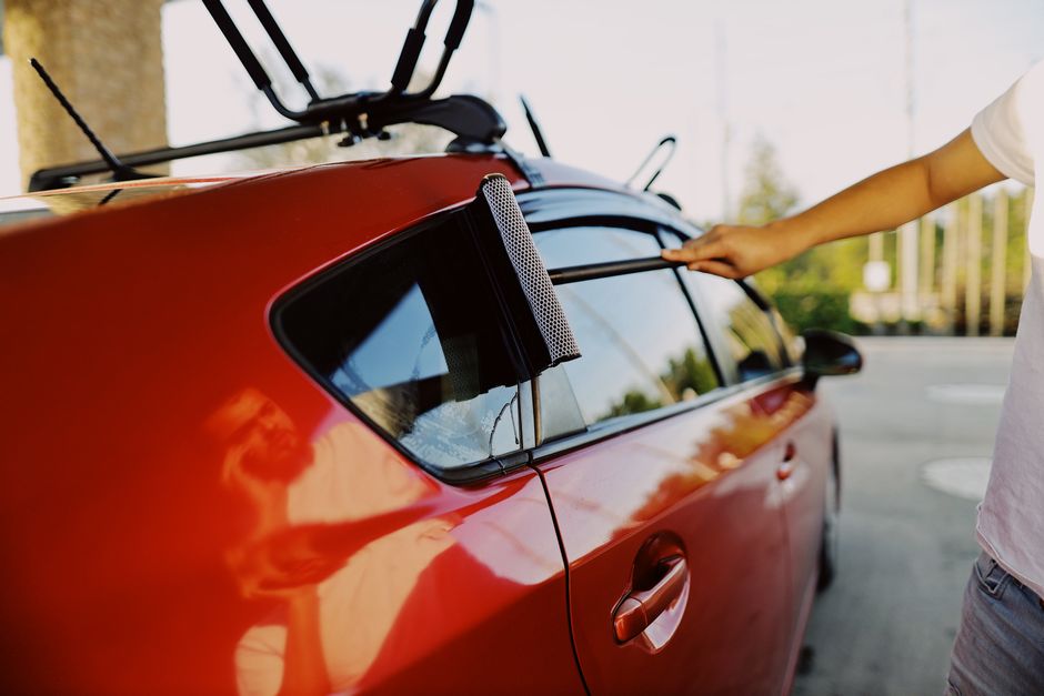 Cleaning car window post-repair